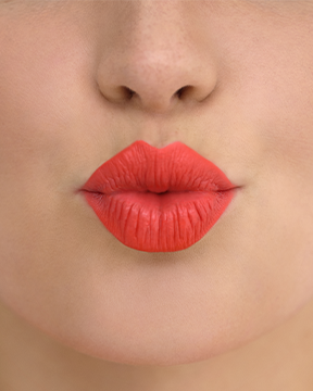 red lips blowing a kiss